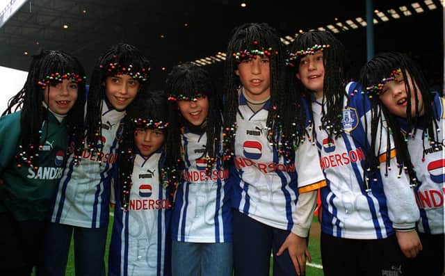  Young Sheffield Wednesday fans wearing Regi Blinker wigs...see story 