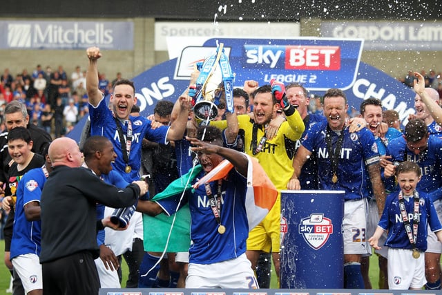 Champagne celebrations as Chesterfield mark their League Two title win at the Proact.