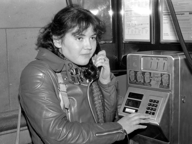 Teenager using new push-button telephones at Waverley Station, Edinburgh in February 1980.