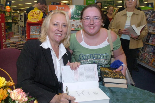 Pictured at W H Smiths, Meadowhall, where writer Martina Cole was seen signing copies of her book The Take. With her is fan Maria Oflaherty from Wincobank, Sheffield.