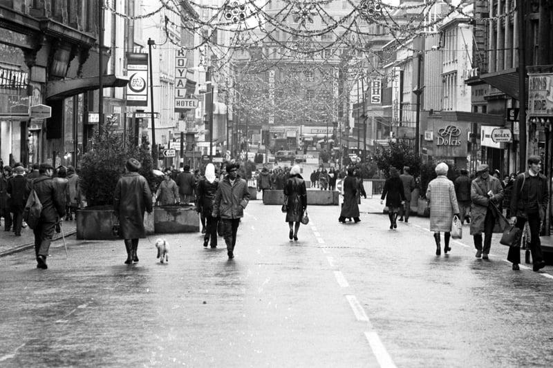 People doing Christmas shopping in a traffic-free Sauchiehall Street in December 1972.Some features are still recognisable today. 