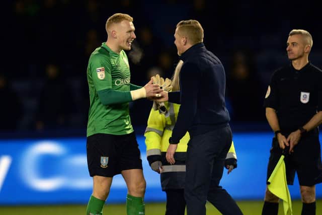 One of Sheffield Wednesday's younger players Cameron Dawson with boss Garry Monk. Pic Steve Ellis