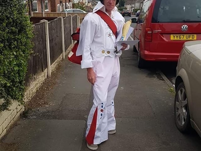 Postman David Evans on his rounds in Edlington
