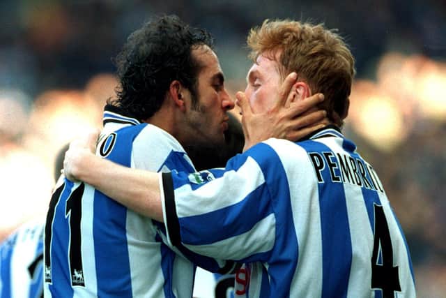 Sheffield Wednesday's Paolo Di Canio gets close to team-mate Mark Pembridge