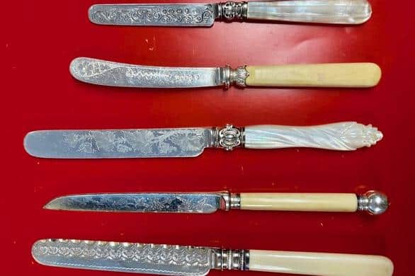 Beautifully-decorated table knives from Dennis Smith's donations to the Hawley Collection