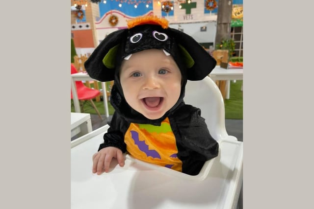 How cute does eight month old Oliver look in his monster costume?