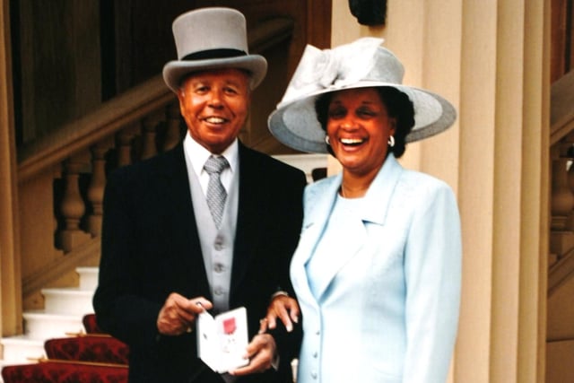 Barnsley-born TV star comedian Charlie Williams, receiving an MBE in 1999