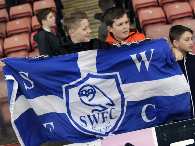 Young Owls fans flying the flag for Sheffield Wednesday at Oakwell in 2017....Pic Steve Ellis