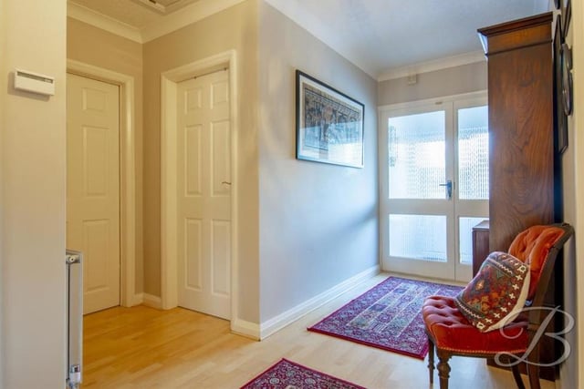 From the moment you step into the bungalow, you feel at home. And as you walk into this entrance hallway, you are sure to be impressed by how much space the property has to offer.