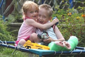 Who can you spot in these hugging pictures?  Ben Naylor gets a hug from his sister when she heard that he had raised the £27,000 needed for  a lift at Rivelin school for him to use back in 2004