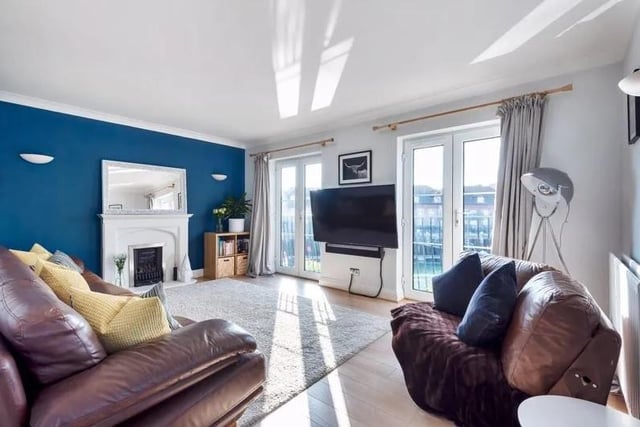 This four bedroom terraced home with views over Camber Dock, Old Portsmouth is on sale for £950,000. Look inside the living room.