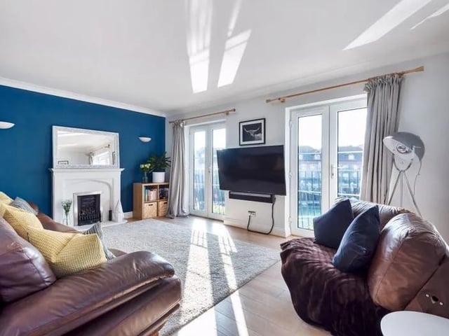 This four bedroom terraced home with views over Camber Dock, Old Portsmouth is on sale for £950,000. Look inside the living room.