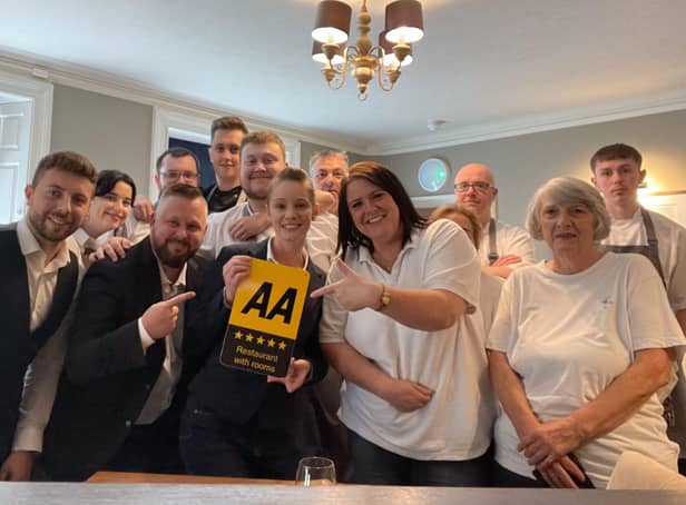 The hotel team celebrate the five star rating