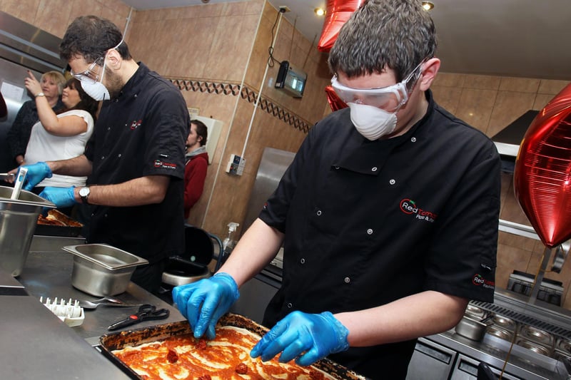 Competitors took on the world's hottest pizza challenge at Red Tomato on Thorne Road in Doncaster in 2015. Chef Nicki Currie prepares the pizza with the hot chillies.