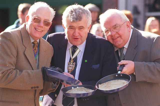 The 2000 Shopmobility Pancake Race in Orchard Square. From left:  Lord Mayor Coun Trevor Bagshaw, Master Cutler Stuart Johnson and Chamber of Trade President Jeff Robertson pictured before the race.