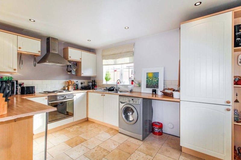 Kitchen - with a range of fitted units and some integrated appliances