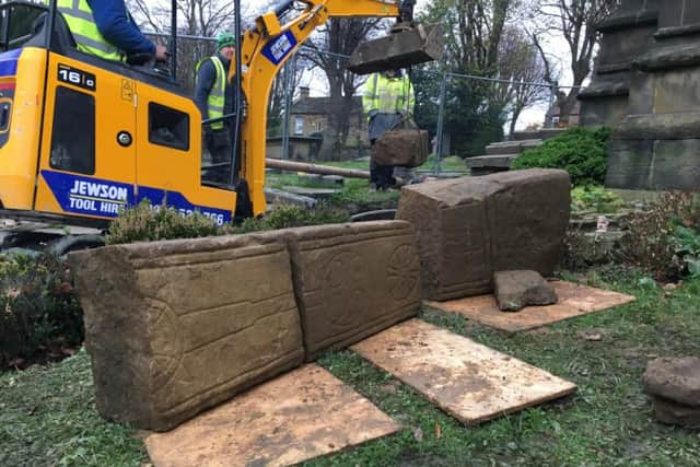 Sections of the cross being dug up by builders at St Mary's Church, Ecclesfield