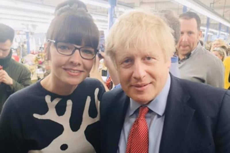 Kizzy Amans, said: "Me and Boris when he came to visit my work place John Smedley Knitwear."