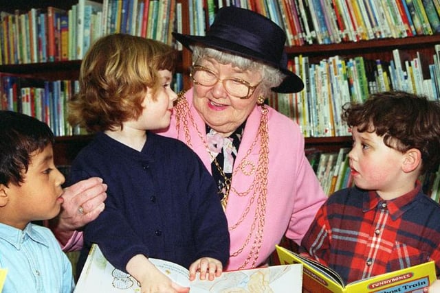 Children (aged 4) reading in the library with mayor Dorothy Layton.  in 1997.