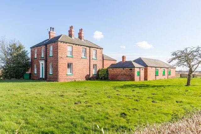 This four bedroom farmhouse has a range of barns. Marketed by Fine & Country, 01302 457827.