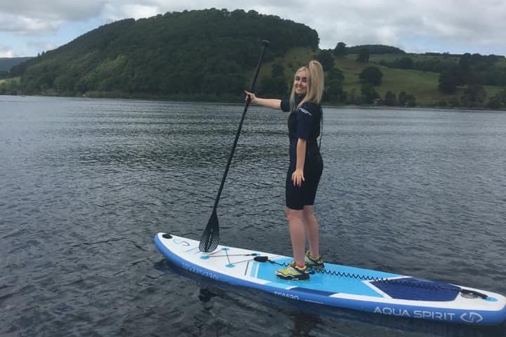Paddle boarding in the Lake District.