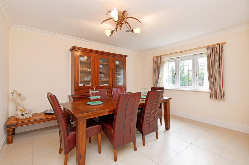 A fabulous formal dining room with ample space for a full-size dining table. It has a front facing double glazed leaded window, coved ceiling and tiled flooring with under floor heating.