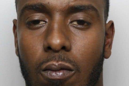 Abdi Ali is wanted over the murder of Shaun Lyall