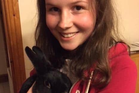 Pictured is RSPCA foster-carer Nia Ball who has found fostering rabbits for the animal charity very rewarding.