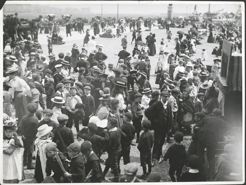 Crowds on the beach at Southsea in the 1890s. Photo by F. J. Mortimer/Hulton Archive/Getty Images