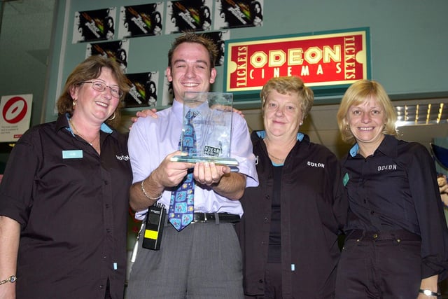 Doncaster's Odeon Cinema won an Oscars 2001 award. Our picture shows cinema general manager Robert Nicholas and staff, from left, Susan Mellor, Mary Cowpe and Melanie Richardson, with the Odeon Penine Region customer care award trophy