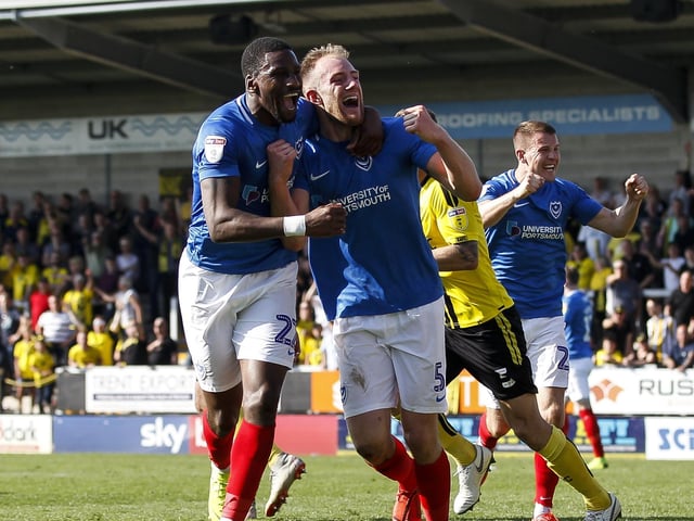 Matt Clarke celebrates his late winner with Omar Bogle.