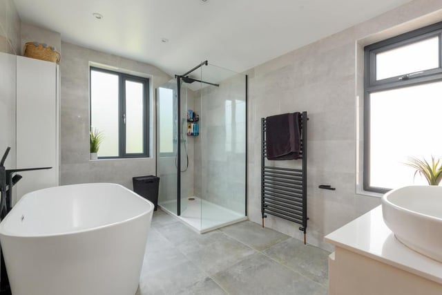 This stunning renovated modern bathroom is one of the highlights of the home. It's immaculate finish looks great, and a standing bath and walk-in shower is a very nice touch.