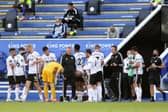 Sheffield United's manager Chris Wilder, centre, gives instructions to his players during the English Premier League soccer match between Leicester City and Sheffield United at the King Power Stadium, in Leicester, England, Thursday, July 16, 2020. (Cath Ivill/Pool via AP)