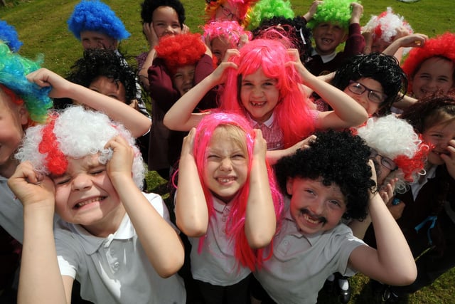Holy Trinity Primary School hosted a Wig Wednesday fun day in 2014. Who do you recognise among the children having a great time?