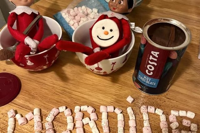 Katie Kent shared this picture of her elves getting up to mischief with hot chocolate.