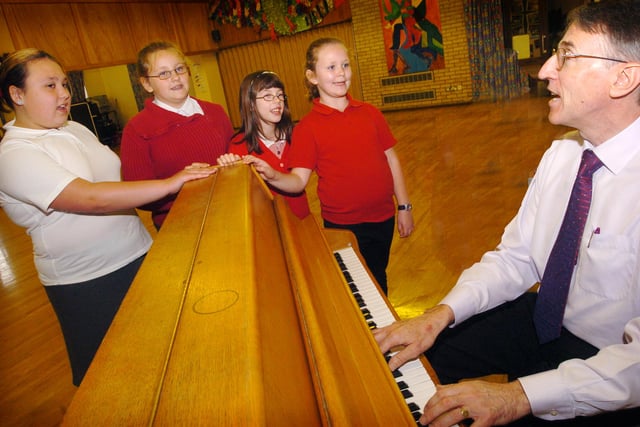 Martin Chadwick, music teacher with Doncaster Music Service warmed up memebrs of the Balby Central Primary School Choir in 2007 before taking part in the "Big Sing". L-R Charlotte Williams,11, Jessica Welch,11, Rebecca Armin, ten and Charlotte Coates, ten