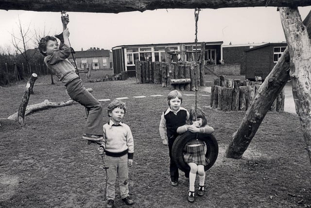 Children from Aston Springwood school at their adventure playground. L to R Wayne Locking, Robert Smith, Frazer Picot and Lynne Ropedr all aged 5, March 1976
