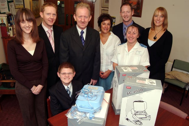 The Bostrom family presened four nebulisers purchased through the Shires Pharmacy at Shirebrook to Ward 2 at Kings Mill Hospital in 2006 in memory of Moira Bostrom. Moiras husband Ray, centre, made the presentation supported by his family to ward staff. Pictured from the left are; Louise Yarnell, sons Peter and Martin Bostrom, Ray Bostrom, Deputy Ward Leader Helen Barker, son Paul Bostrom, Staff Nurse Mary Box and Clare Edis.