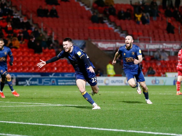 Will Forrester celebrates his second half equaliser.