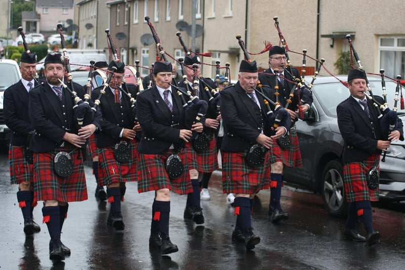 East Kilbride Pipe Band members were also delighted to be back out on the streets, performing to a crowd.