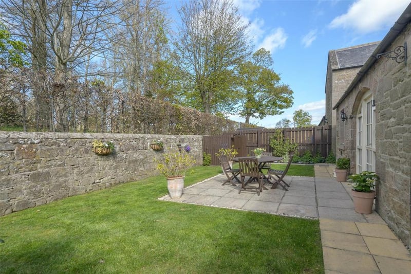 The property benefits from lovely lawned gardens. Beyond the rear garden is a further fenced paddock area.
