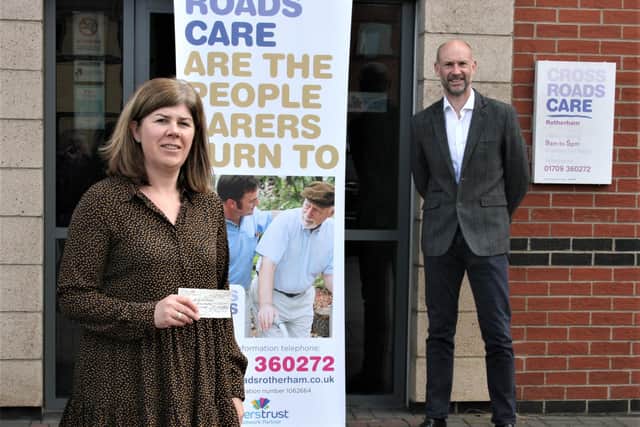 Richard Russum, Rotherham’s newest Feoffee, delivers the donation to Helen Cryan, CEO of Crossroads Care Rotherham