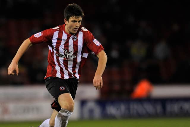 Harry Maguire in action for Sheffield United against Rochdale