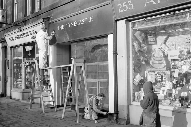 Painters put finishing touches to the office of the Tynecastle Development Club, at 254 Dalry Road, in March 1963.