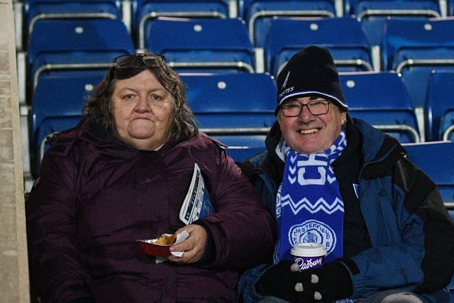 Chesterfield fans wrap up warm against the cold before their side's game with Harrogate Town.