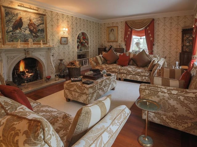 The house holds a large reception hall, three reception rooms and study, a master bedroom suite, four further bedrooms, one with an ensuite, and three bathrooms