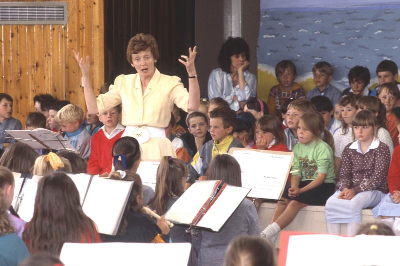 Teacher Eileen Watson with some of the 400 children who took part in two "recorder days" at Plains Farm Primary School.  Schools involved were from East Herrington, Washington, Shiney Row and Rickleton.