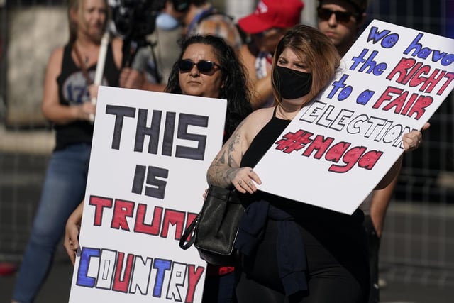 Supporters of President Donald Trump rally outside the Maricopa County Recorder's Office (AP Photo/Ross D. Franklin)