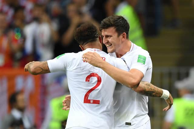 Kyle Walker and Harry Maguire of England celebrate during the 2018 FIFA World Cup.