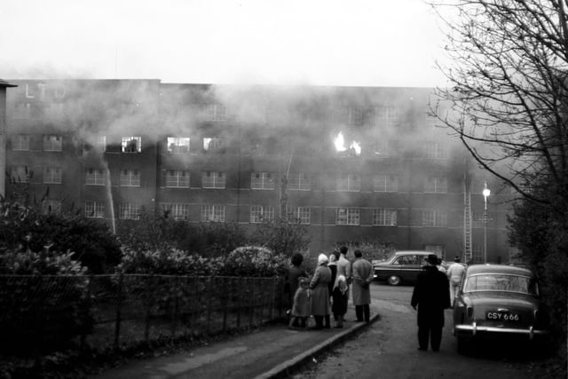 People watch the fire at the George IV whisky warehouse in Queensferry in November 1965.